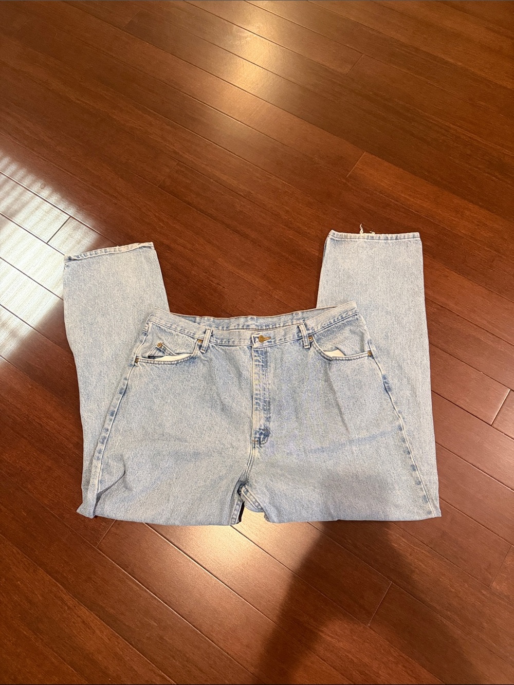 Riders by Lee light blue denim jeans with tan leather patch